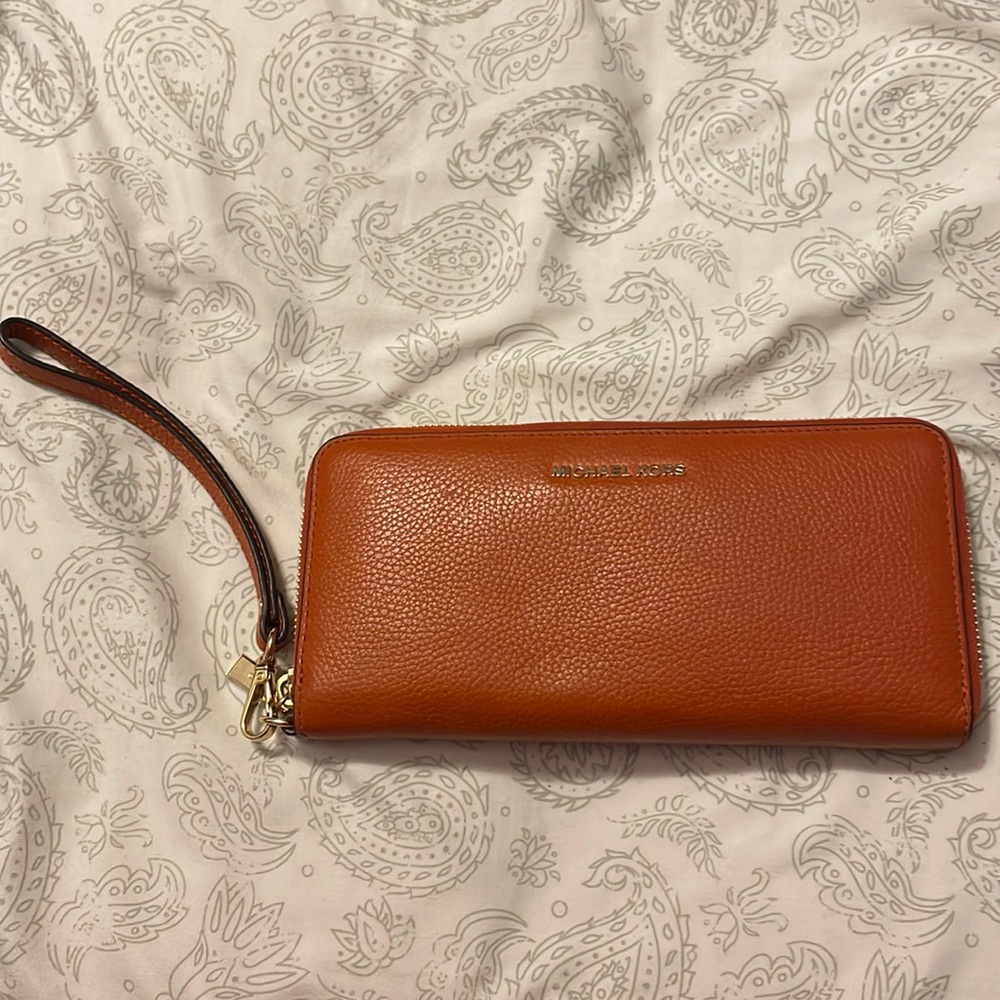 Authentic burnt orange Michael Kors wristlet